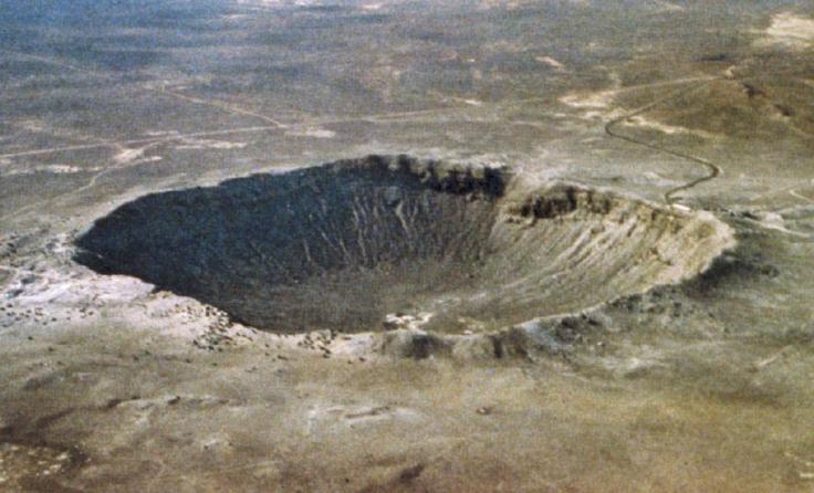 Meteor crater in Arizona. One of the most familiar meteor craters on earth is a bit less than 1 mile wide. Image credit: Wikpedia.