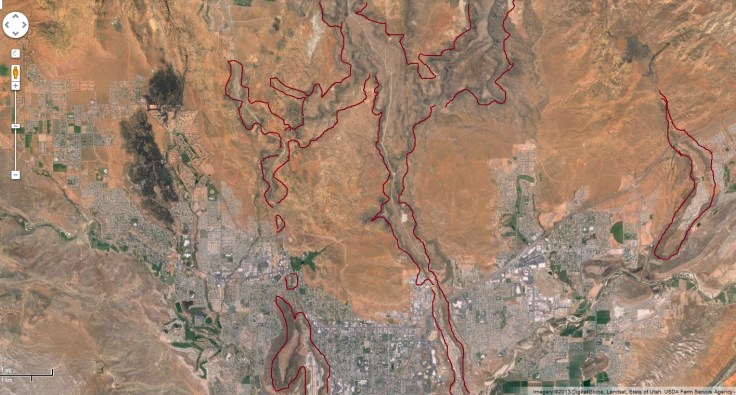 This is a large overview of the St. George area showing the source of the lava flows.  I have outlined the major lava fields that still remain today.  The lava came from up north were there is a large moutain with massive lava fields.  Google and the Google logo are registered trademarks of Google Inc  and used with permission.