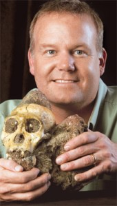 Professor Lee Berger holding his most famous fossil find, a crania of Austripithicus sebida. This fossil was found not far from the current location of the 