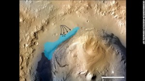 Gale Crater showing position of proposed aluvial (river) deposits and ancient lake system.  I have added the approximate position of the rover (star) and large crater that it can now see in at the base of the Gale crater wall (arrow down).  Image from NASA/JPL/Caltech