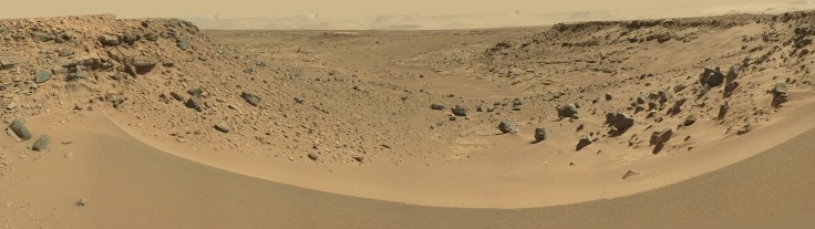 The view from "dingo gap" by the Curiosity rover in Gale crater on Mars.  This image was stitched together by Emily Lakdawalla from images available from NASA/JPL/Caltech on sol 528 (Jan 28, 2014).  You need to click on this image to see the full size! Visit Lakdawalla's blog.
