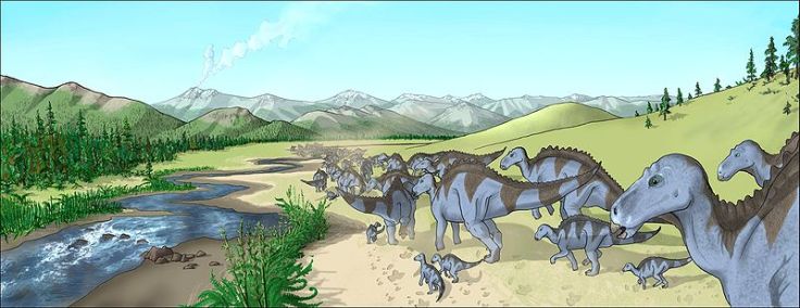 A herd of Maiasaura, a hadrosaur from the Upper Cretaceous of North America, walking along a creekbed in a semi-arid landscape what is today the Two Medicine Formation.  Credit: Wikipedia, user Debivort