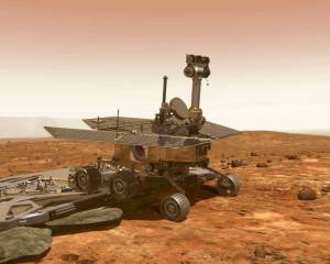 Artistic impression of Opportunity rolling off its lander onto Mars for the first time.