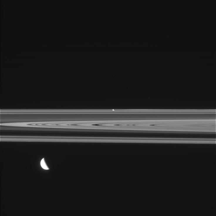 Cassini image of the rings of Saturn with three moons. Image: NASA/JPL/Caltech