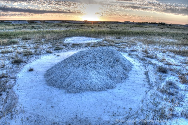 Sunrise near Wall, South Dakota, over a nearly completely eroded hill. The badlands area is eroding at a very fast pace of about 1 inch per year. in a few decades this small hill will be gone. Photo: Joel Duff, June 2016. 